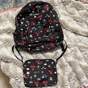 Murmur Black Travel Bag Set with Red Accents